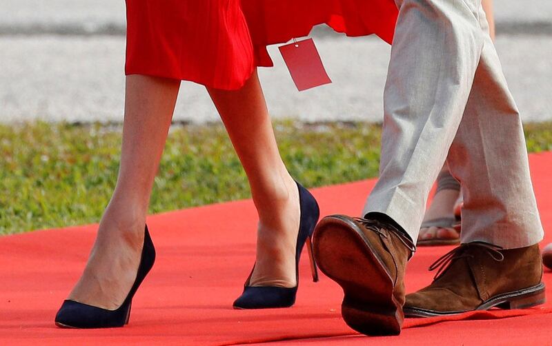 Britain's Prince Harry and Meghan, Duchess of Sussex, arrive at Fua'amotu airport on the main island Tongatapu in Tonga October 25, 2018. REUTERS/Phil Noble