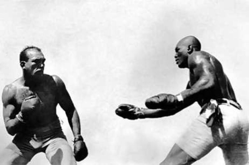 In this photo taken July 4, 1910, Jack Johnson, right, fights "Great White Hope" Jim Jeffries in Reno, Nevada.