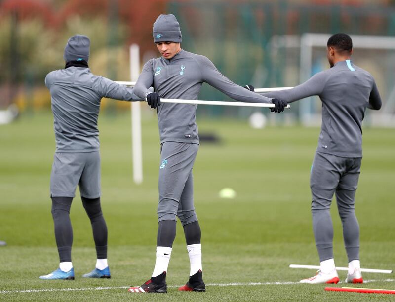 Dele Alli joins his teammates in an exercise. Reuters