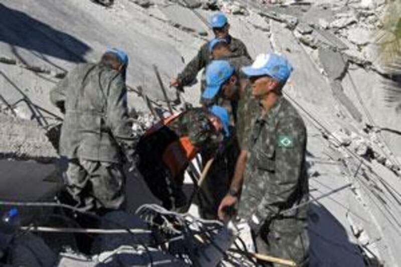 UN peacekeepers search for survivors at the world body's headquarters in Haiti following the deadly earthquake in January.