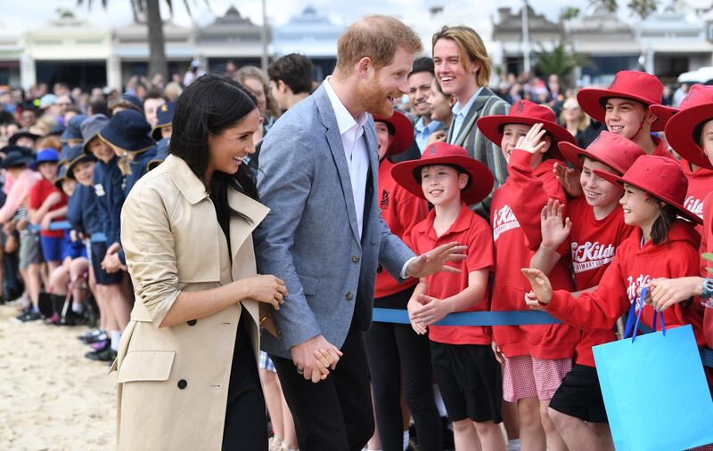 The royal couple visit primary school students at South Melbourne beach. EPA