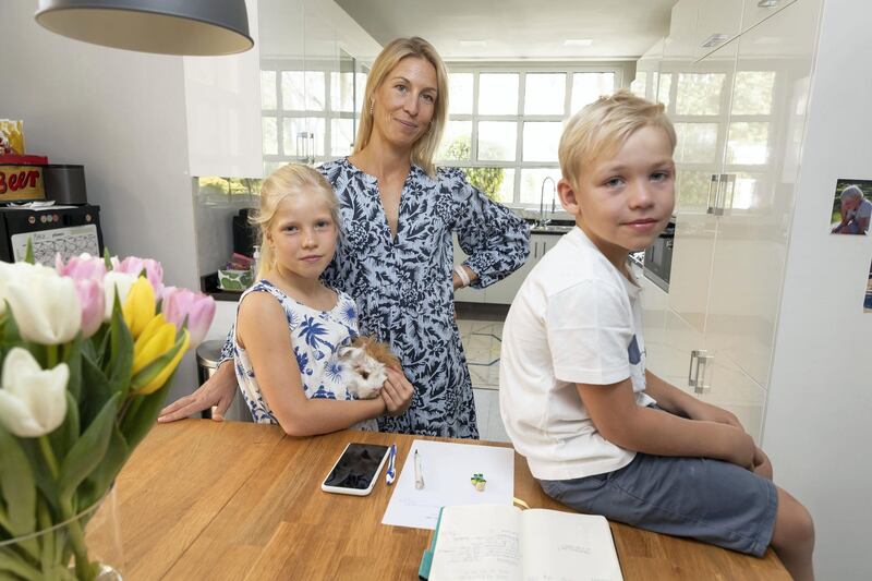 DUBAI, UNITED ARAB EMIRATES. 19 MARCH 2021. Clara Cloché, mother of three, for a story on parental burn-out. In the picture with her is two of her three children, Noah (6) and daughter Lea (7). (Photo: Antonie Robertson/The National) Journalist: Kelly Clarke. Section: National.