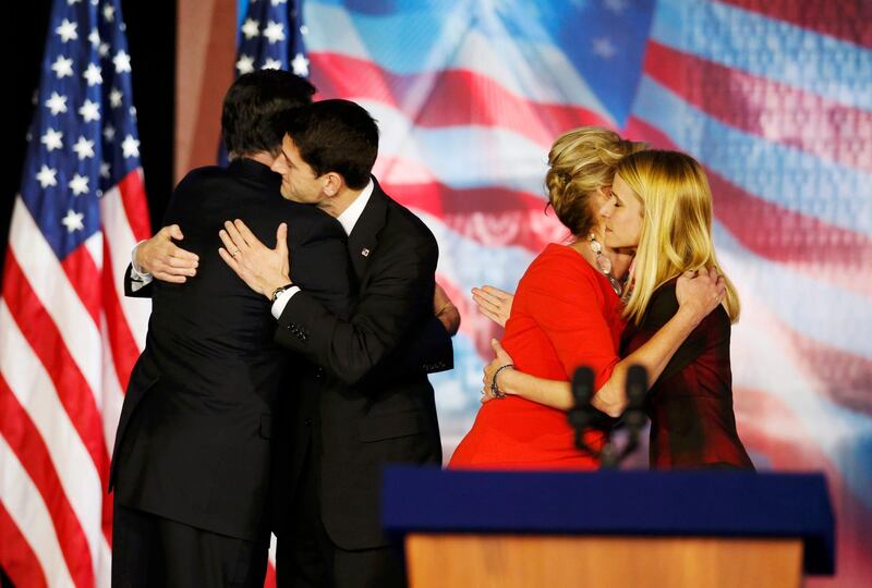 U.S. Republican presidential nominee Mitt Romney (L) and Republican vice presidential nominee Paul Ryan (2nd L) hug as their wives wife Ann Romney (2nd R) and Janna Ryan hug after Romney delivered his concession speech after losing the election to U.S. President Barack Obama, during his election night rally in Boston, Massachusetts  November 7, 2012.         REUTERS/Mike Segar (UNITED STATES  - Tags: POLITICS ELECTIONS USA PRESIDENTIAL ELECTION)   *** Local Caption ***  BOS530_USA-CAMPAIGN_1107_11.JPG