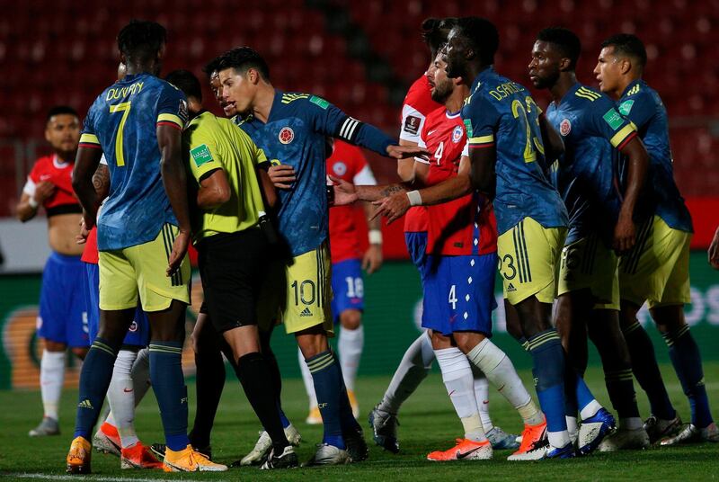 Tampers flare during the match. AFP