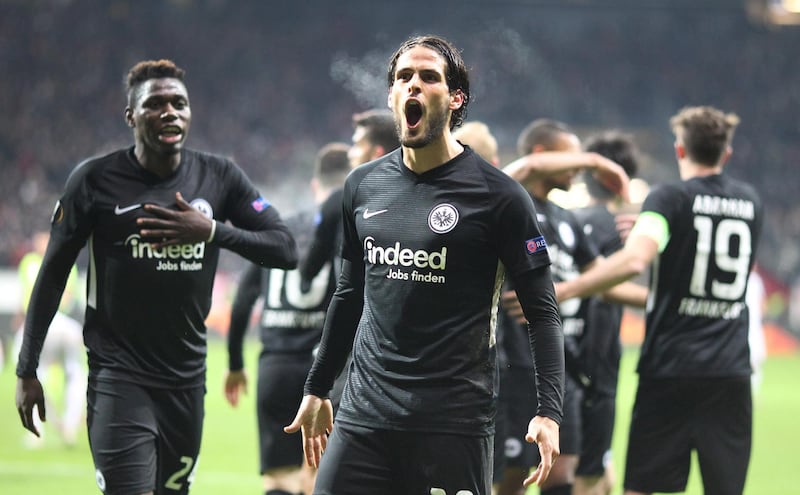 Frankfurt's Portuguese forward Goncalo Paciencia celebrates with teammates after the 2-1 during the UEFA Europa League Group F football match Eintracht Frankfurt  v Vitoria Guimaraes in Frankfurt am Main, western Germany, on December 12, 2019. (Photo by Daniel ROLAND / AFP)