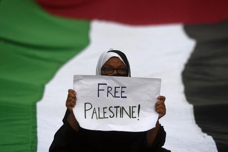 A woman in Karachi takes part in a protest against Israel's attacks on the Palestinian Gaza Strip. AFP