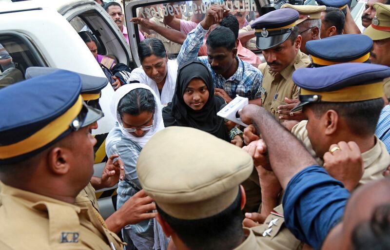 Akhila, 24, who converted to Islam in 2016 and took a new name, Hadiya, arrives at the airport in Kochi, India November 25, 2017. REUTERS/Sivaram V