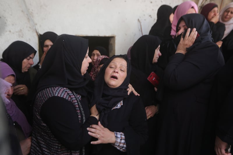 Mourners attend the funeral of Palestinian Yahya Adwan at the West Bank village of Azzun. EPA