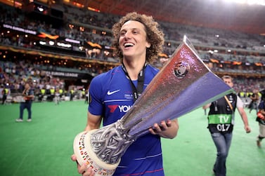 Chelsea's David Luiz celebrates with the trophy after the UEFA Europa League final at The Olympic Stadium, Baku, Azerbaijan. PRESS ASSOCIATION Photo. Picture date: Wednesday May 29, 2019. See PA SOCCER Europa. Photo credit should read: Adam Davy/PA Wire