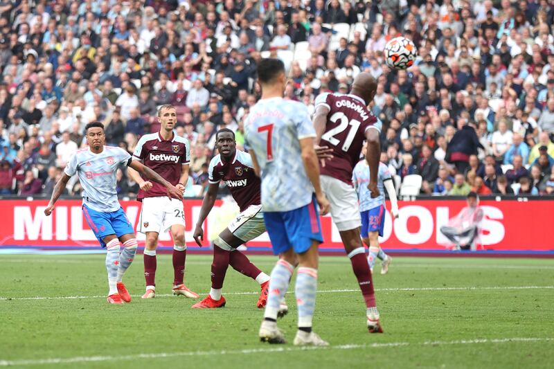 Kurt Zouma - 8: Had been a very impressive league debut for the Hammers until he gave Lingard too much space to fire home the second goal – and also should have conceded late penalty for foul on Ronaldo. Before then, the former Chelsea man had looked unbeatable on the ground and in the air. Getty