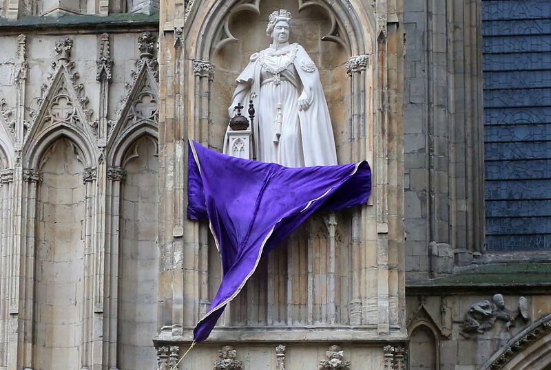 A statue of Queen Elizabeth II is unveiled at York Minster in York, northern England. AFP