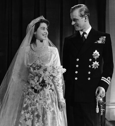 Princess Elizabeth, later Queen Elizabeth II, with her husband Phillip, Duke of Edinburgh, on their wedding day, November 20, 1947. Getty Images