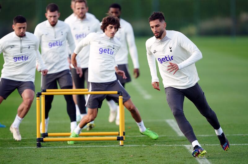 Tottenham's Rodrigo Bentancur, right, during training. PA
