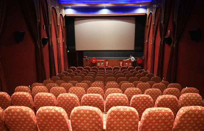 epa08292085 An Indian worker sanitizes an auditorium of Delite Diamond cinema hall after it is temporarily shut down as the precautionary measure for Coronavirus COVID19 in New Delhi, India, 13 March 2020. To stringent measures in regard to international travel, all existing visas issued to nationals of any country except those issued to diplomats, officials, UN/International organizations, employment, project visas stand suspended until 15 April 2020 and all incoming travelers including Indian nationals, arriving from or having visited China, Italy, Iran, Republic of Korea, France, Spain and Germany after 15 February 2020 shall be quarantined for a minimum period of 14 days in view of 81 confirmed cases of COVID-19 in India and the advisory will come into effect at 12:00 hours GMT on 13 March, at the port of departure.  EPA/RAJAT GUPTA