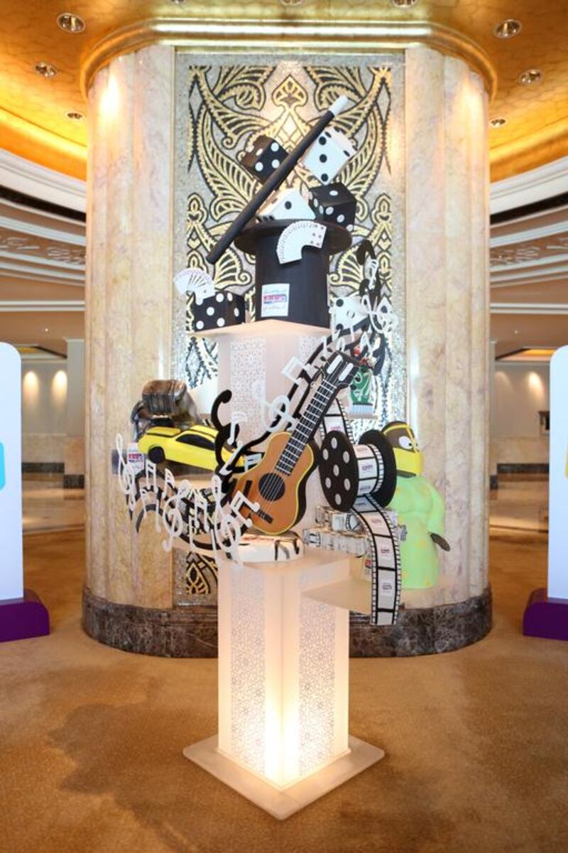 The cake features everything from a guitar to promote upcoming concerts, to a magician’s hat and deck of cards to spotlight David Blaine’s visit to a character from on stage performance of Freej Live: Abood’s Dream.