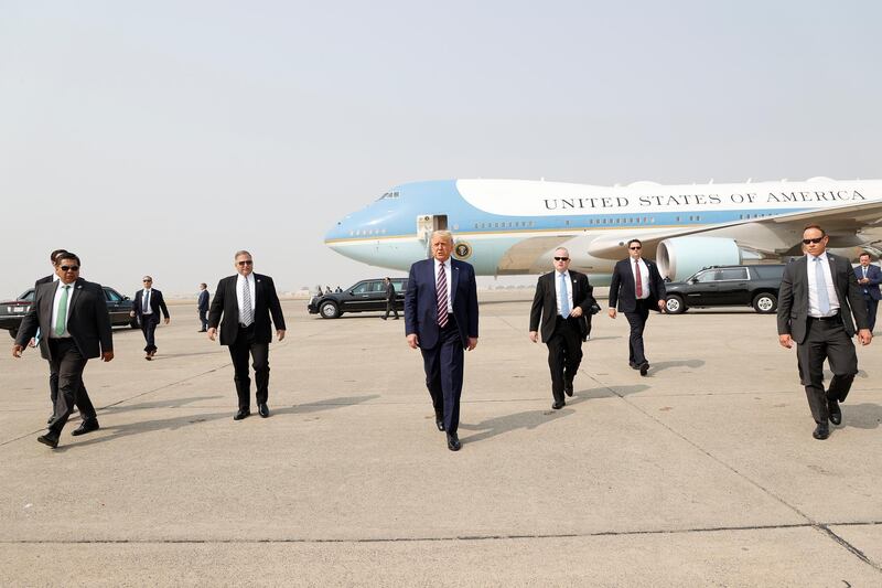 epa08939649 (FILE) US President Donald J. Trump (C) walks towards the media platform surrounded by his secret service detail after arriving on Air Force One at Sacramento McClellan Airport in McClelland Park, California, USA, 14 September 2020. The President visited Sacramento County to be briefed on the deadly wildfires that have burned more than three million acres across California. The presidency of Donald Trump, which records two presidential impeachments, will end at noon on 20 January 2021.  EPA-EFE/JOHN G. MABANGLO *** Local Caption *** 56621663