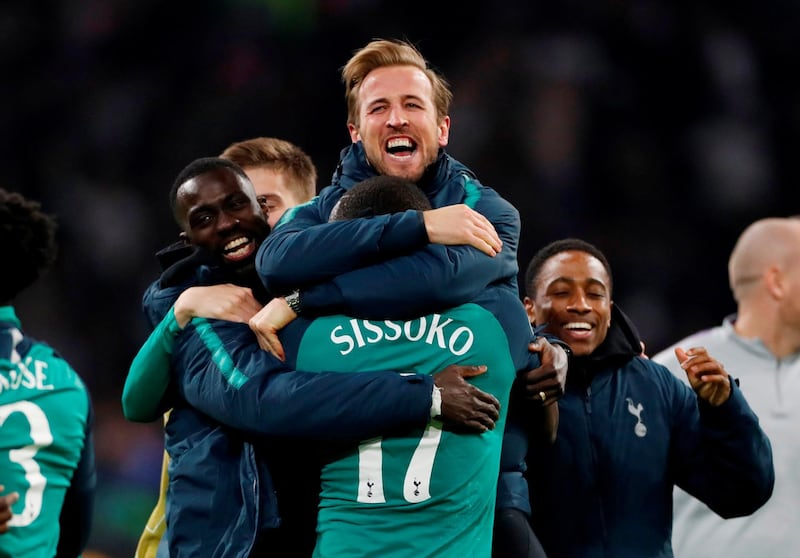 Tottenham's Harry Kane celebrates with Moussa Sissoko and teammates after Spurs staged an incredible fightback to beat Ajax 3-2 in Amsterdam. Reuters