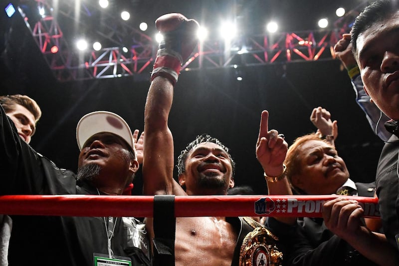 Manny Pacquiao celebrates his victory. AFP