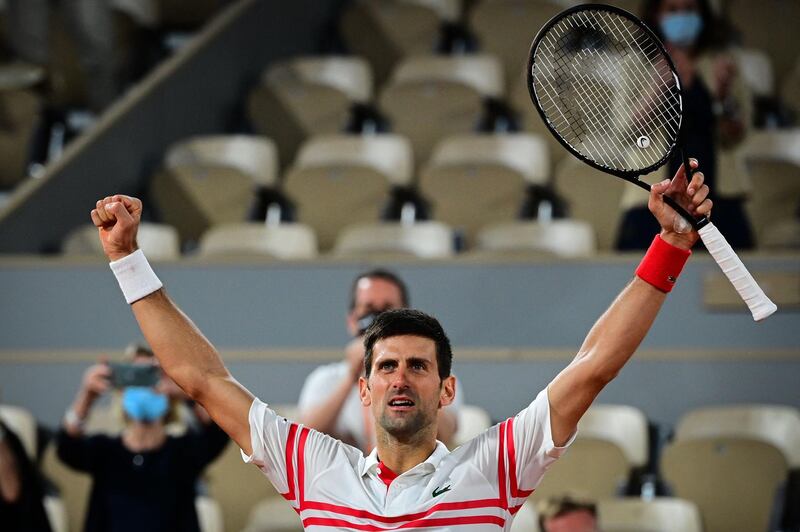 Novak Djokovic celebrates after beating Rafael in the French Open semi-final. AFP