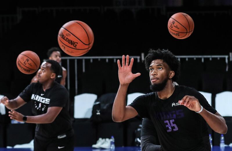 Sacramento Kings player Marvin Bagley, right, during a training session at NSCI dome in Mumba on Thursday, October 3.  EPA