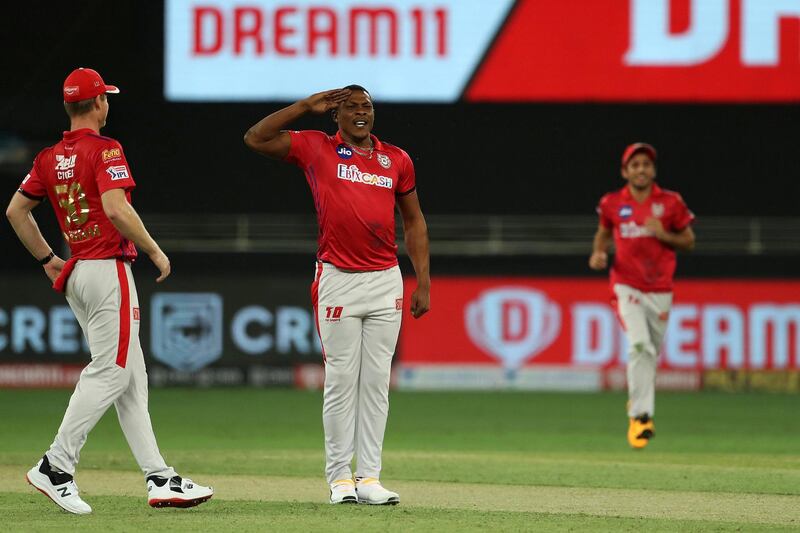Sheldon Cottrell of Kings XI Punjab celebrates the wicket of Devdutt Padikkal of Royal Challengers Bangalore during match 6 of season 13 of the Dream 11 Indian Premier League (IPL) between Kings XI Punjab and Royal Challengers Bangalore held at the Dubai International Cricket Stadium, Dubai in the United Arab Emirates on the 24th September 2020.  Photo by: Ron Gaunt  / Sportzpics for BCCI