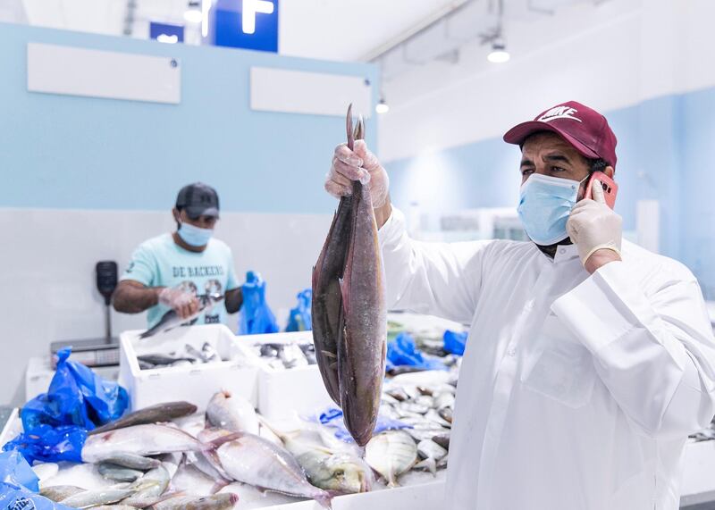 DUBAI, UNITED ARAB EMIRATES. 7 APRIL 2020. 
The Fish Market in the Waterfront Market in Deira, near Hamriya Port, has been given permission by authorities to reopen today. (Photo: Reem Mohammed/The National)

Reporter:
Section:
