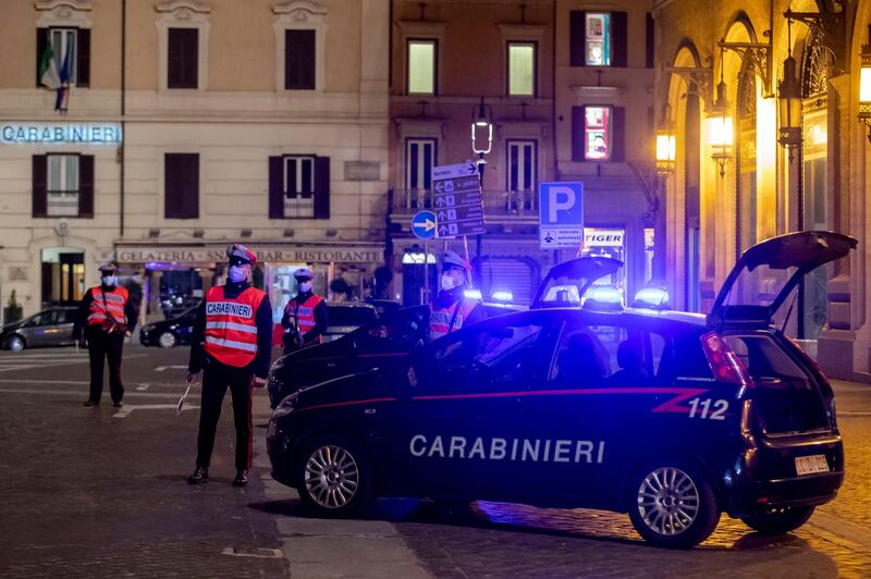Carabinieri patrol the streets close to Venezia square and Corso street during the last weekend before the new measures against the Covid-19 pandemic come into force, in downtown Rome, Italy. EPA