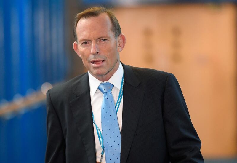 FILE PHOTO: Australia's former Prime Minister Tony Abbott attends Britain's annual Conservative Party Conference in Birmingham, Britain, October 5, 2016. REUTERS/Toby Melville/File Photo