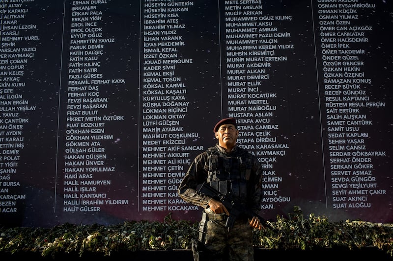 ISTANBUL, TURKEY - JULY 12: A statue of a soldier is seen in front of a wall showing the names of people killed during the events of the July 15, 2016 coup attempt at an anniversary site setup to mark the first anniversary of the failed coup attempt in Taksim square on July 12, 2017 in Istanbul, Turkey. July 15, 2017 will mark the first anniversary of the failed coup attempt which saw 249 people die when military personnel attempted to over throw the government and President Recep Tayyip Erdogan. Extensive commemorations have been planned for the  July 15 anniversary and the day has been declared an annual holiday.  (Photo by Chris McGrath/Getty Images)
