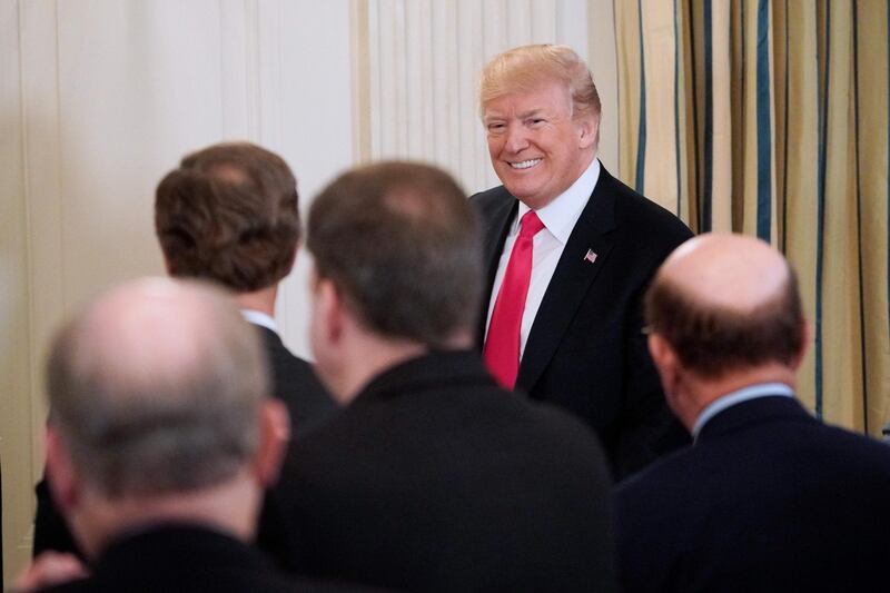 US President Donald Trump arrives for the 2018 White House business session with state governors in the State dining Room of the White House on February 26, 2018 in Washington, DC. / AFP PHOTO / MANDEL NGAN
