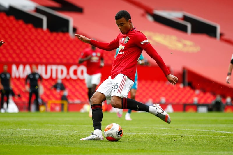 Manchester United's Mason Greenwood scores his team's first goal. AP
