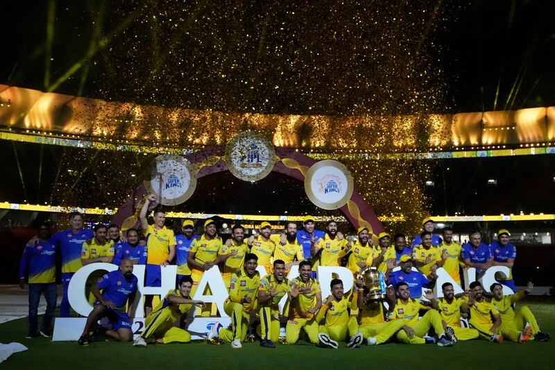 Chennai Super Kings players celebrate after their win in the IPL final against Gujarat Titans in Ahmedabad, India, on Tuesday. AP