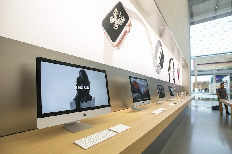 Mac computers on display at the Apple Store in Yas Island. Mona Al Marzooqi / The National