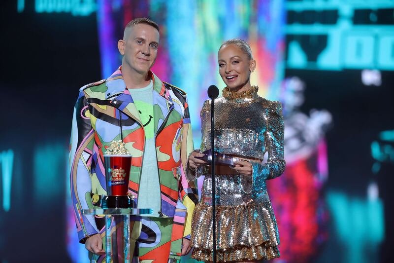 Jeremy Scott and Nicole Richie present onstage. Getty Images / AFP
