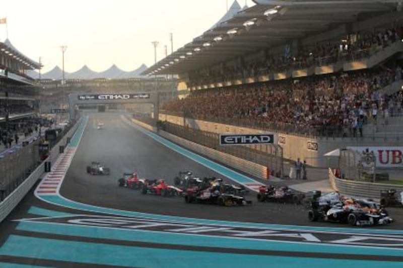 Abu Dhabi, United Arab Emirates, November 4, 2012:    Collision that saw Force India Formula One driver Nico Hulkenberg of Germany retire from the race on the first corner during the Formula 1 Etihad Airways Abu Dhabi Grand Prix at Yas Marina Circuit in Abu Dhabi on November 4, 2012. Christopher Pike / The National








