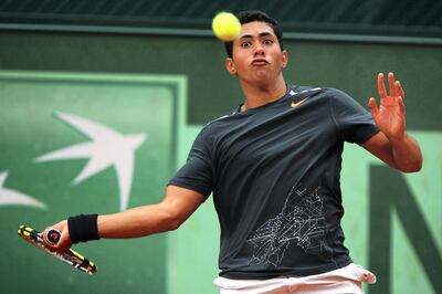 PARIS, FRANCE - JUNE 04:  Karim Hossam of Egypt plays a forehand during his boys' singles first round match against Liam Broady of Great Britain during day nine of the French Open at Roland Garros on June 4, 2012 in Paris, France.  (Photo by Getty Images/Getty Images)