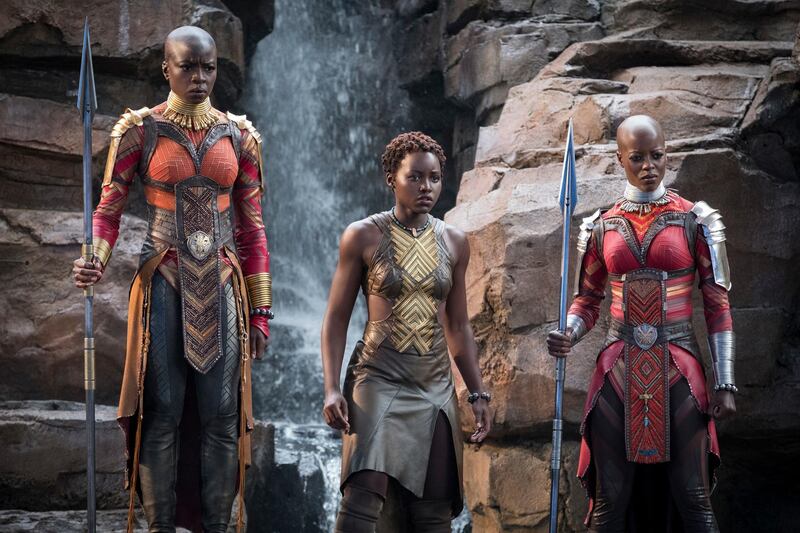 From left, Danai Gurira, Lupita Nyong'o and Florence Kasumba in a scene from "Black Panther." Gurira says the representation of women in “Black Panther” is important for young girls to see. The film features a number of powerful female leads, including Gurira as the head of a special forces unit, Lupita Nyong’o as a spy, Angela Bassett as the Queen Mother and newcomer Letitia Wright as a scientist and inventor. AP