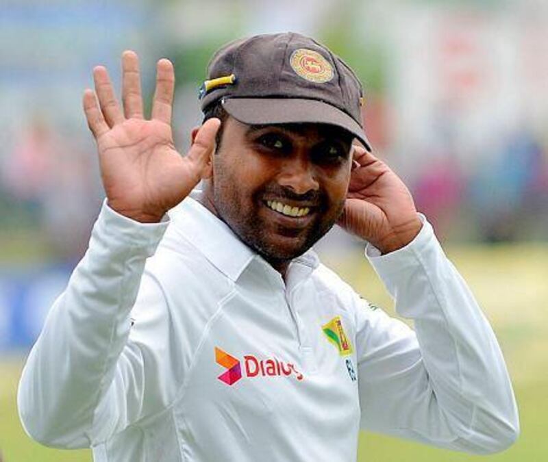 Sri Lankan cricketer Mahela Jayawardene waves to the crowd during the fourth day of the second Test match between Sri Lanka and Pakistan at The Sinhalese Sports Club (SSC) Ground in Colombo on August 17, 2014. Jayawardene, 37, is due to retire and is playing his last Test match on his home ground in the Sri Lankan capital. AFP PHOTO/ Ishara S.KODIKARA