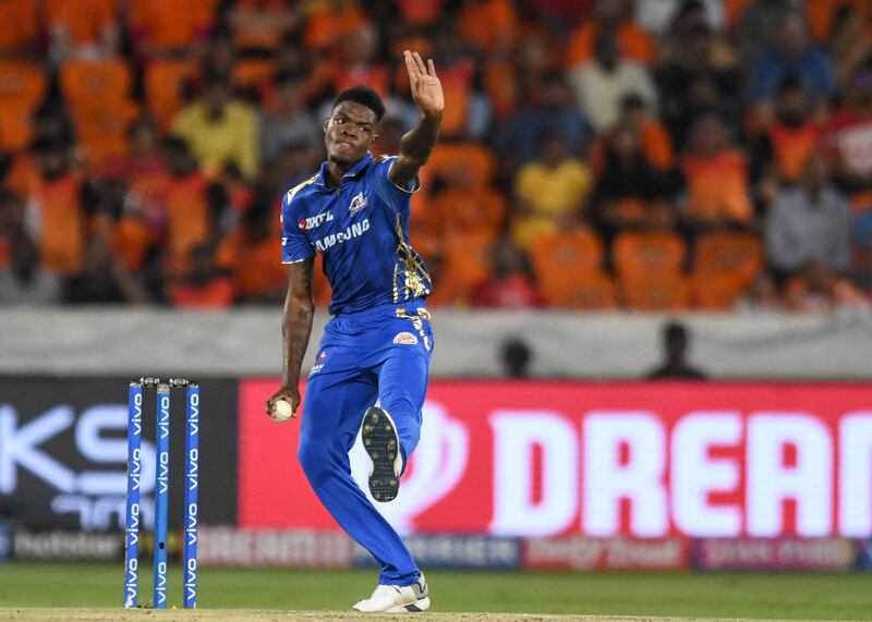 Mumbai Indians cricketer Alzarri Joseph bowls during the 2019 Indian Premier League (IPL) Twenty20 cricket match between Sunrisers Hyderabad and Mumbai Indians at The Rajiv Gandhi International Cricket Stadium in Hyderabad on April 6, 2019. (Photo by NOAH SEELAM / AFP) / IMAGE RESTRICTED TO EDITORIAL USE - STRICTLY NO COMMERCIAL USE