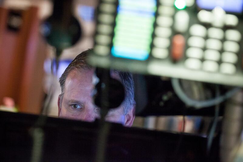 A trader works on the floor of the New York Stock Exchange (NYSE) in New York, U.S., on Monday, Feb. 12, 2018. U.S. stocks advanced as Treasury yields erased their climb, with financial markets looking to stabilize after the worst week in two years for American equities. Photographer: Michael Nagle/Bloomberg