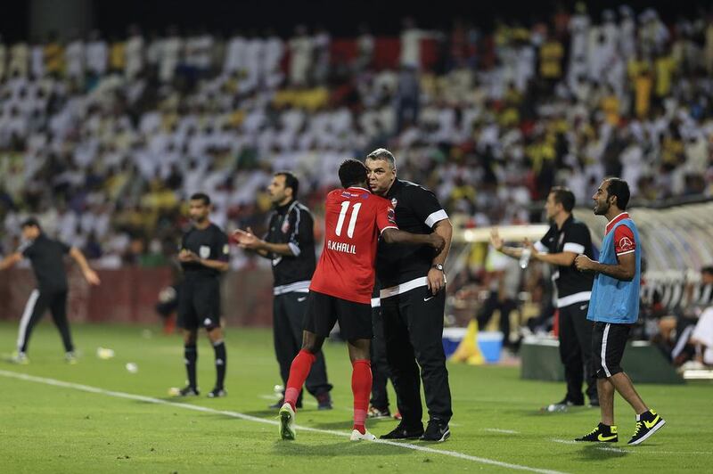 Cosmin Olaroiu, right, was only one of the reasons Al Ahli was celebrating an Arabian Gulf League title on April 10, 2014. Retaining Grafite and signing Walid Abbas and Ciel are two more reasons. Sarah Dea / The National