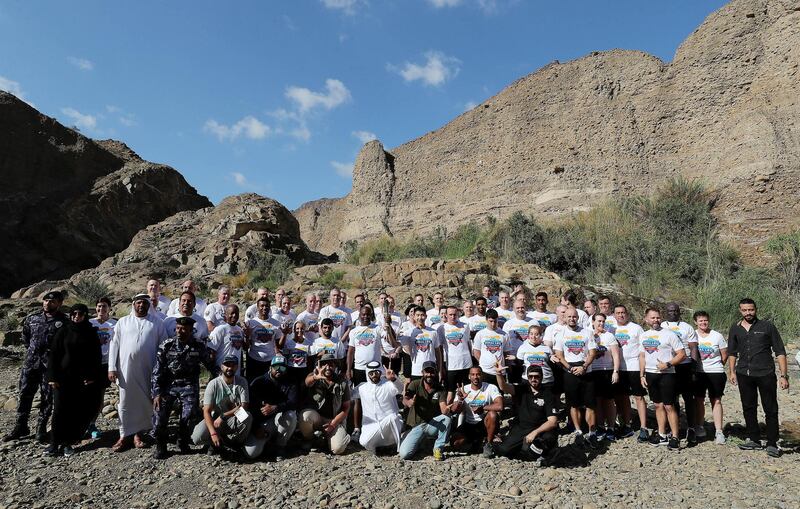 FUJAIRAH , UNITED ARAB EMIRATES , March 4 – 2019 :- Volunteers , officials and staff members of Wadi Al Wurayah with the Special Olympics torch “Flame of Hope” in Wadi Al Wurayah Waterfalls in Fujairah. ( Pawan Singh / The National )
For News/Online/Instagram/Big Picture. Story by Ruba
