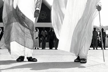 Undated photograph showing (right-left) Sheikh Zayed and his son Sheikh Khalifa. Courtesy Al Ittihad.