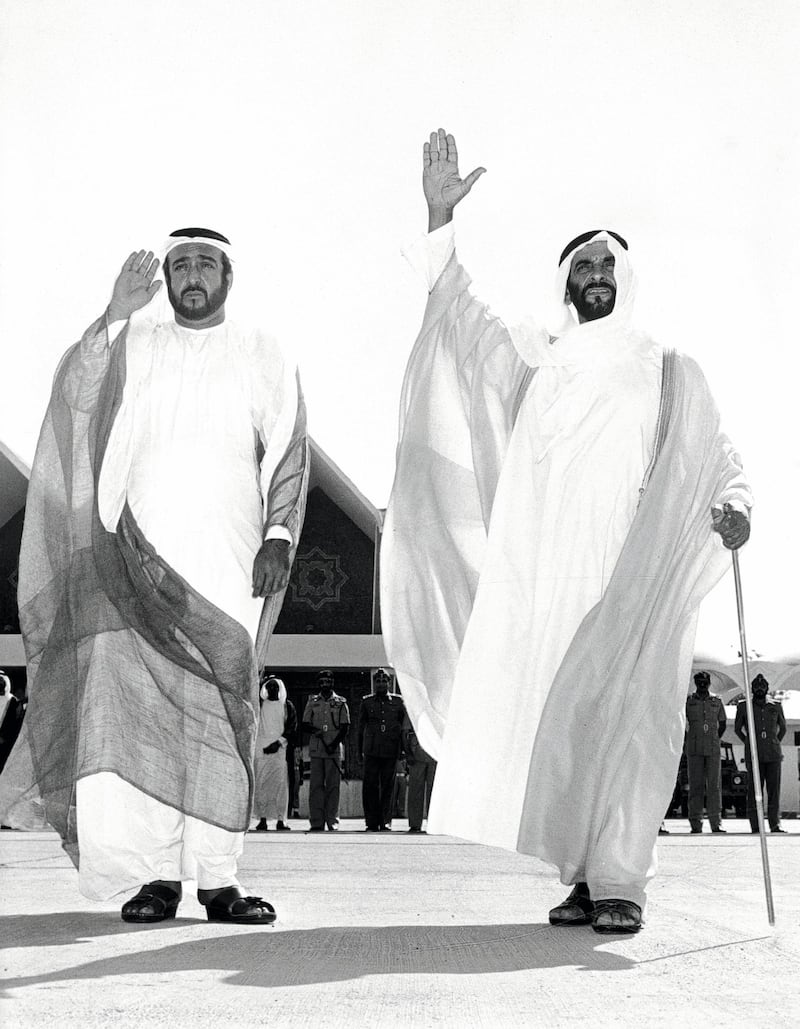 Undated photograph showing (right-left) Sheikh Zayed and his son Sheikh Khalifa. 
Courtesy Al Ittihad. 