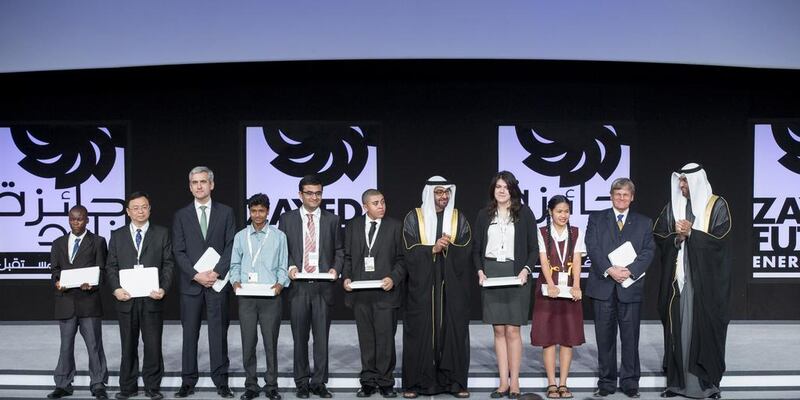 Sheikh Mohammed bin Zayed, Crown Prince of Abu Dhabi and Deputy Supreme Commander of the Armed Forces, and Dr Sultan Al Jaber, Minister of State, chief executive of Masdar and chairman of the Abu Dhabi Ports Company, with the nine proud winners. Christopher Pike / Crown Prince Court - Abu Dhabi