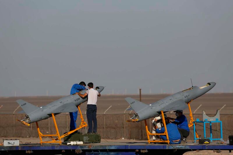 Iranian Army and Air Force personnel work on missile air-defence systems during an exercise at an undisclosed site in Iran on October 21, 2021, when the country began a nationwide air force drill. Iranian Army via EPA
