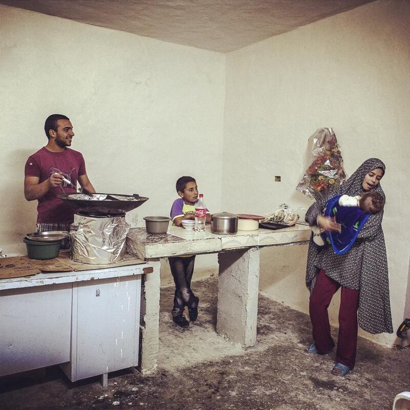 Closing time falafel shop banter, Abwein, West Bank. Photo by Tanya  Habjouqa (@habjouqa), on assignment with Riwaq / 2013.