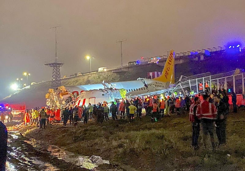 The crash site of a Pegasus Airlines Boeing 737 airplane, after it skidded off the runway upon landing at Sabiha Gokcen airport in Istanbul.  AFP