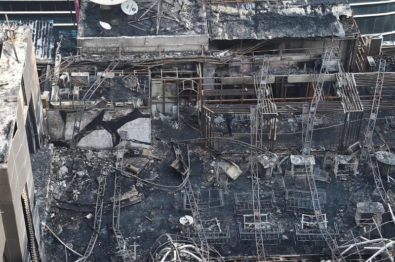 An aerial view of the building's roof after the fire was extinguished. Indranil Mukherjee / AFP