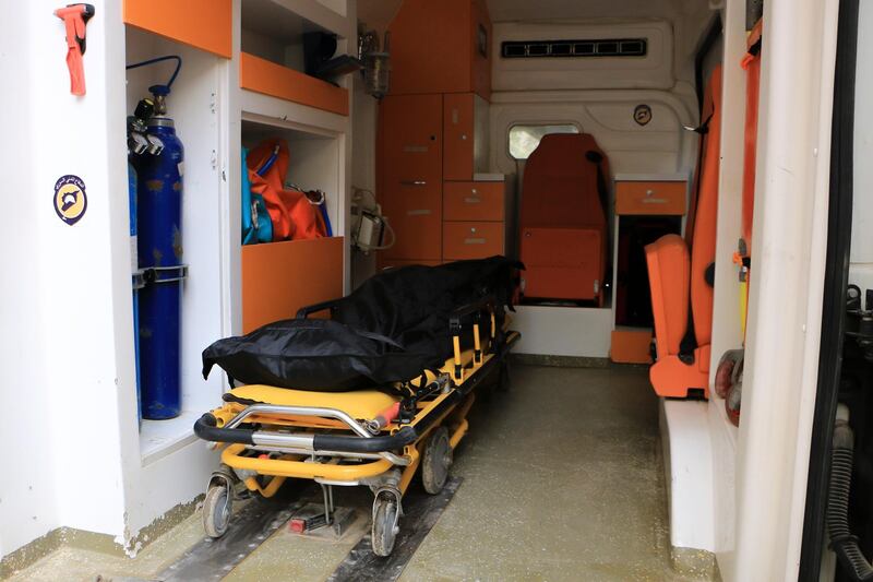 The body of a coronavirus victim inside an ambulance in front of Idlib’s al-Ziraa hospital in Syria. All photos by Abd Almajed Alkarh / The National.